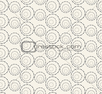 Seamless pattern with dotted circles. Vector repeating texture.