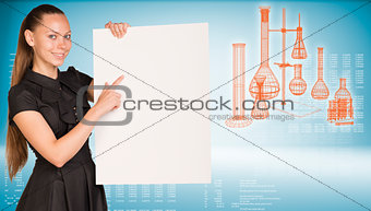 Businesswoman holding empty paper sheet.  Laboratory flasks as backdrop