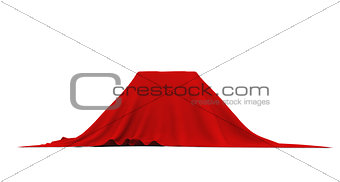 Object of rectangular shape covered with red cloth, on white