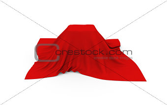 Object of rectangular shape covered with red cloth, on white