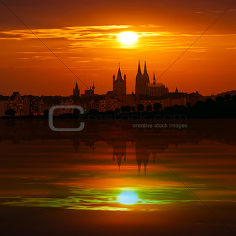 abstract background with silhouette of cologne and sunset