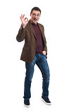 Happy young man gesturing OK sign