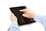 businessman is holding and is touching digital tablet pc
