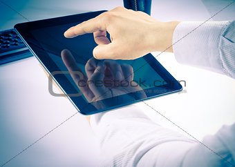 businessman holding digital tablet pc in the office