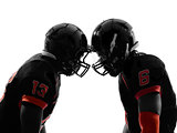 two american football players face to face silhouette