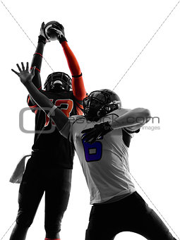 two american football players pass action silhouette