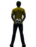 rear view back man holding soccer football silhouette