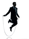 business man exercising jumping rope silhouette