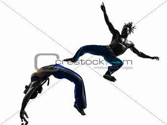 couple capoeira dancers dancing silhouette 