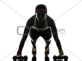 woman exercising fitness workout push ups  silhouette