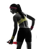 woman exercising fitness holding energy drink  silhouette