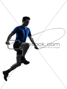 young man exercising jumping rope silhouette