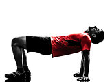 man exercising plank position fitness workout silhouette