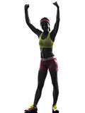 woman exercising fitness arms raised   silhouette
