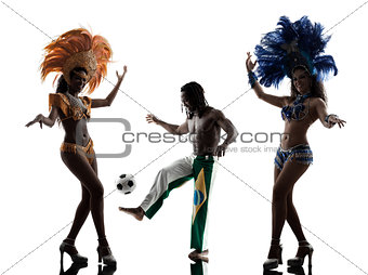 women samba dancer and soccer player man silhouette