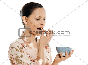 woman asian taking pill