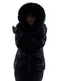 woman winter coat freezing cold silhouette