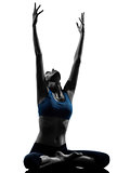 woman exercising yoga meditating sitting stretching silhouette