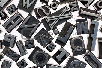 random letters in metal type