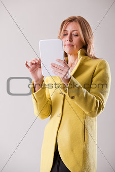 pretty blonde woman using a tablet