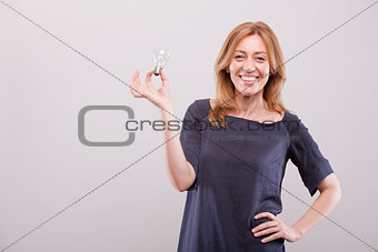 woman idea symbol with blonde and bulb