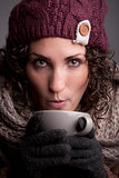 woman with a mugful of a hot drink