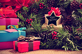 gifts, christmas wreath and text merry christmas in a star-shape