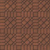 Brown Pavement with a Complicated Pattern.