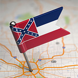 Mississippi Small Flag on a Map Background.
