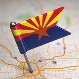 Arizona Small Flag on a Map Background.