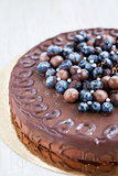 Chocolate cake decorated with fresh berries