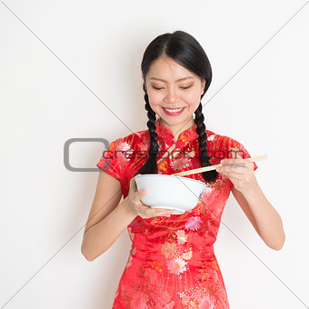 Asian chinese girl eating something