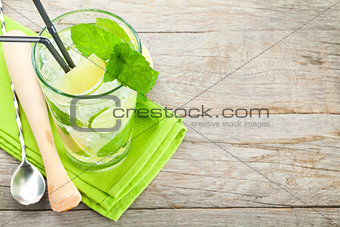 Fresh mojito cocktail and bar utensils