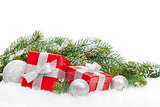 Christmas gift boxes and snow fir tree