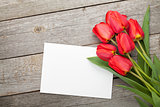Fresh tulips and greeting card