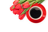 Fresh red tulips with coffee cup