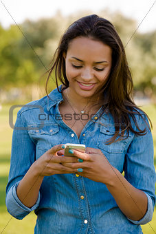 Beautiful woman texting
