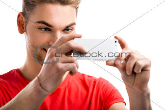Young man taking a selfie