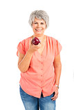 Old woman eating an apple