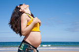pregnant woman showing paunch