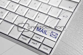 Keyboard with envelope icon.