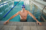 Fit swimmer in pool at leisure center