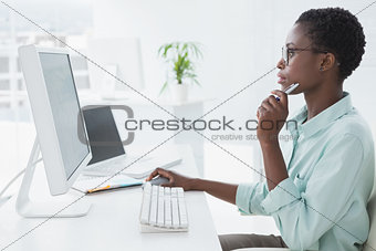 Focused businesswoman working at desk
