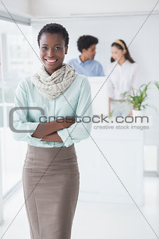 Casual businesswoman smiling at camera