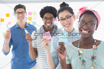 Young creative team smiling at camera