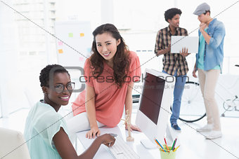 Young creative team working at desk