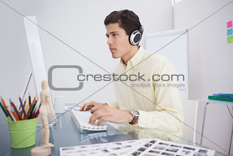 Designer working and listening music