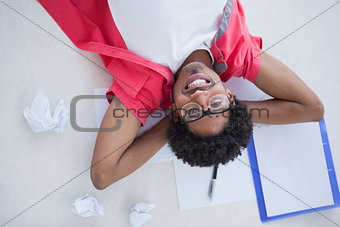 Happy businessman lying and resting
