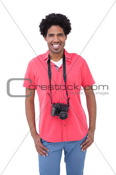Handsome man with camera around his neck