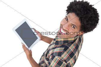 Handsome man using his tablet pc